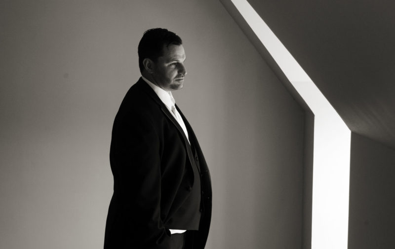 Photos of the groom in window light