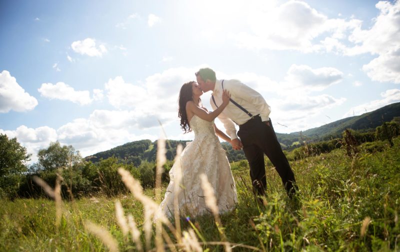 bride-and-groom-in-field